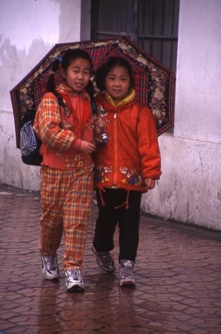 Chinese girls in rain_tif480