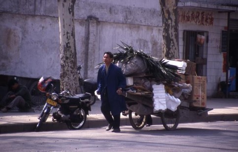 Chinese man pulling cart_tif309